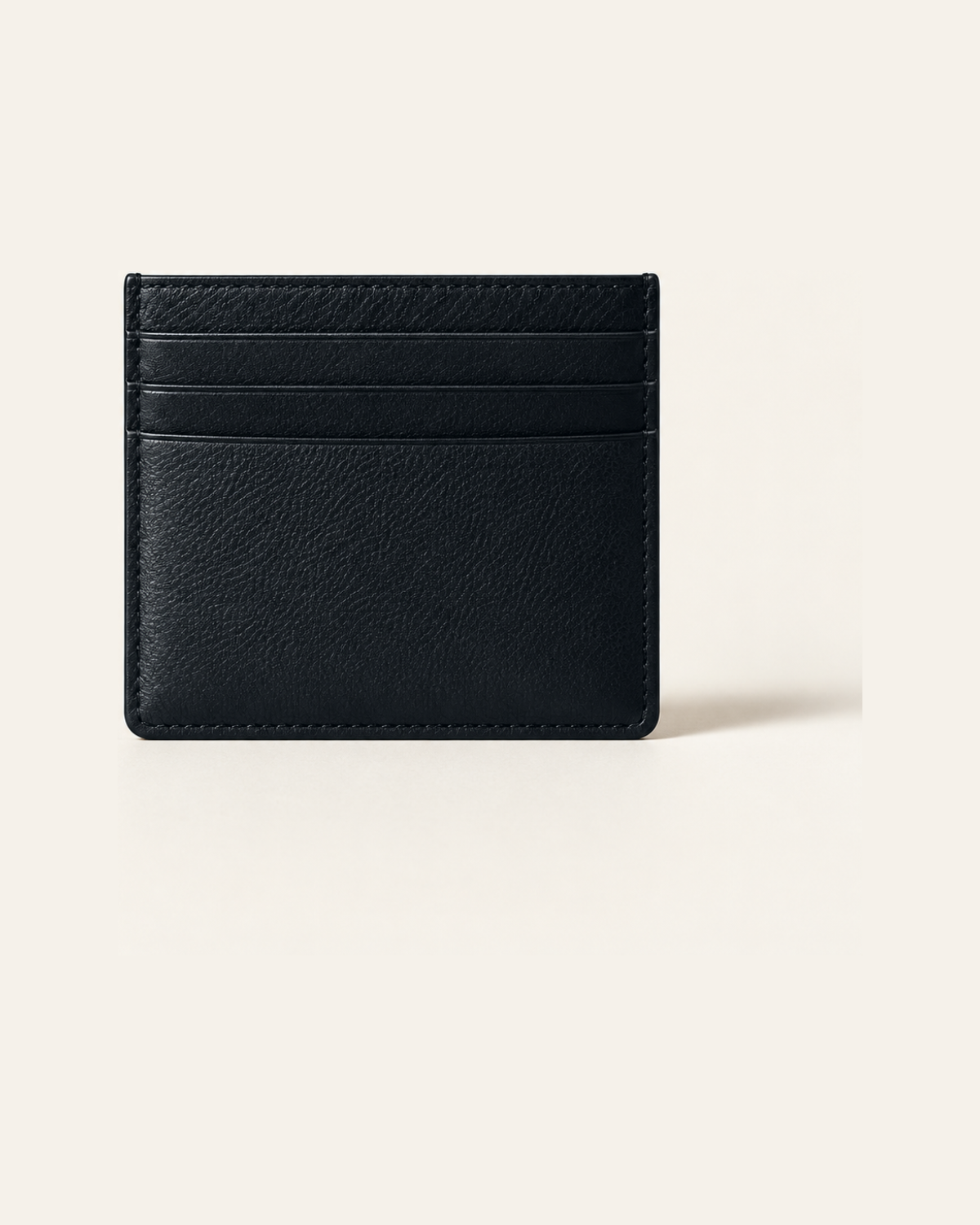 Black card holder on a Cream sweep
